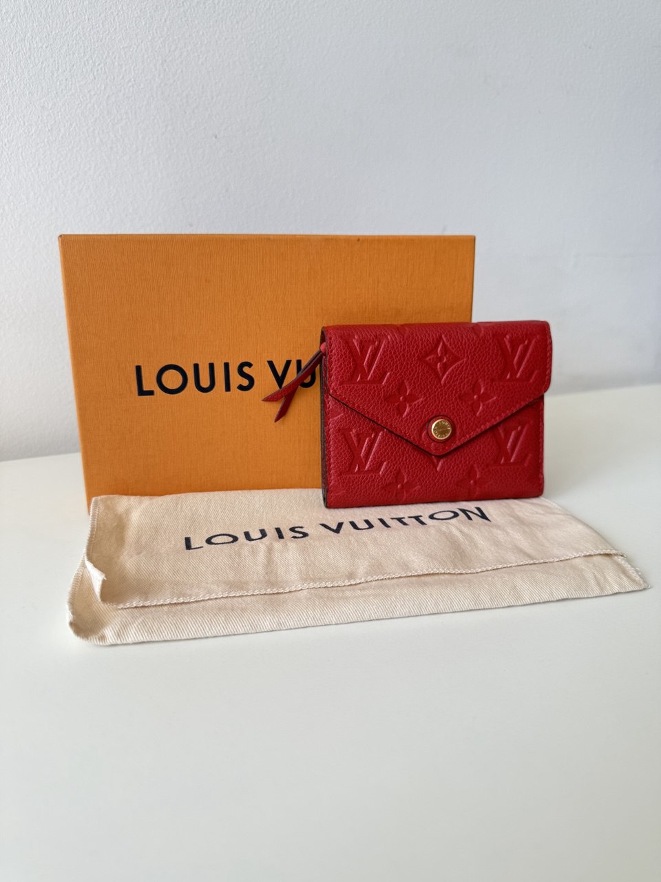 Victorine Wallet in Monogram Empreinte Leather Cherry Berry