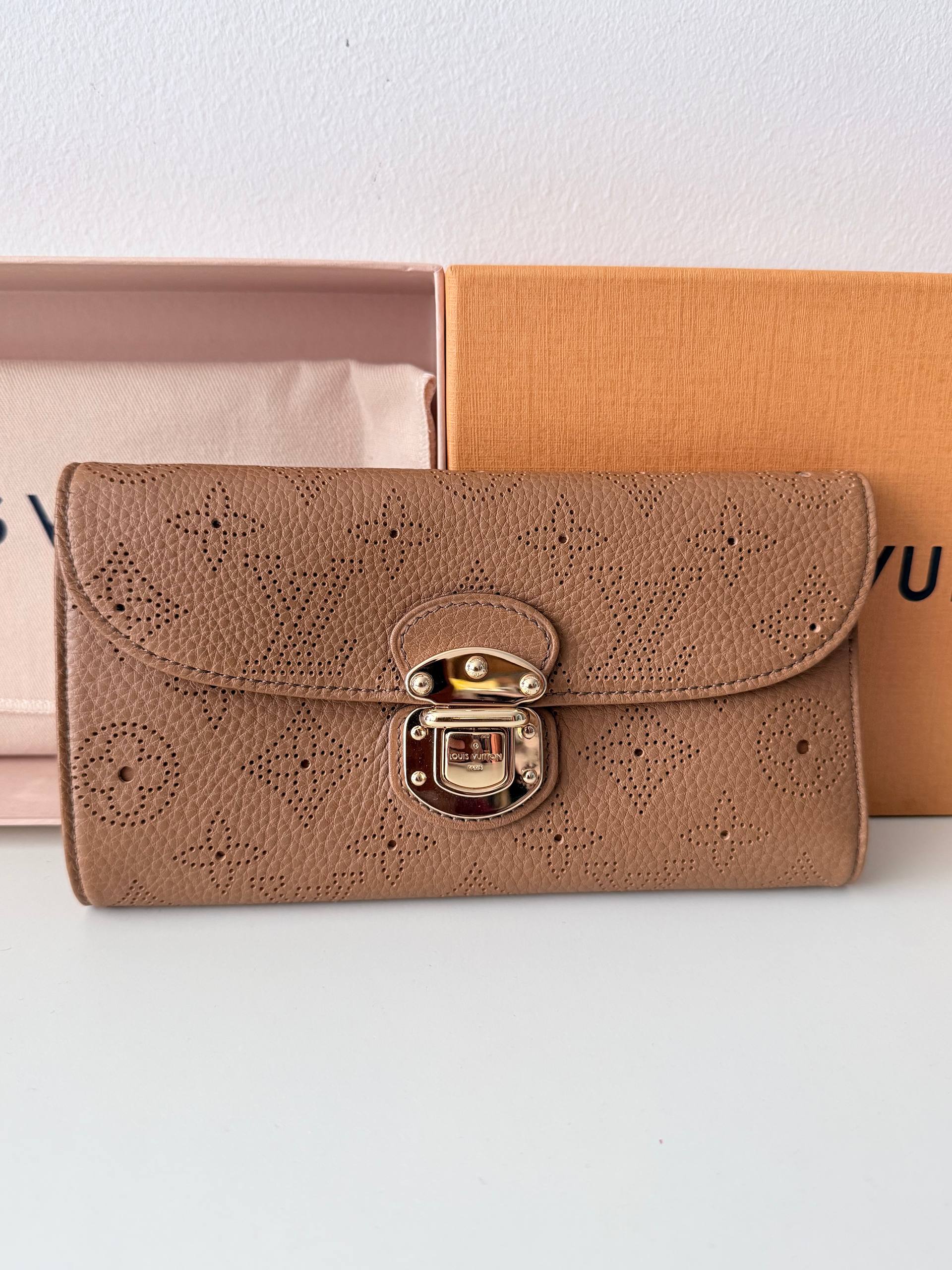 Perforated Monogram Mahina Sarah Wallet — Excellent Condition