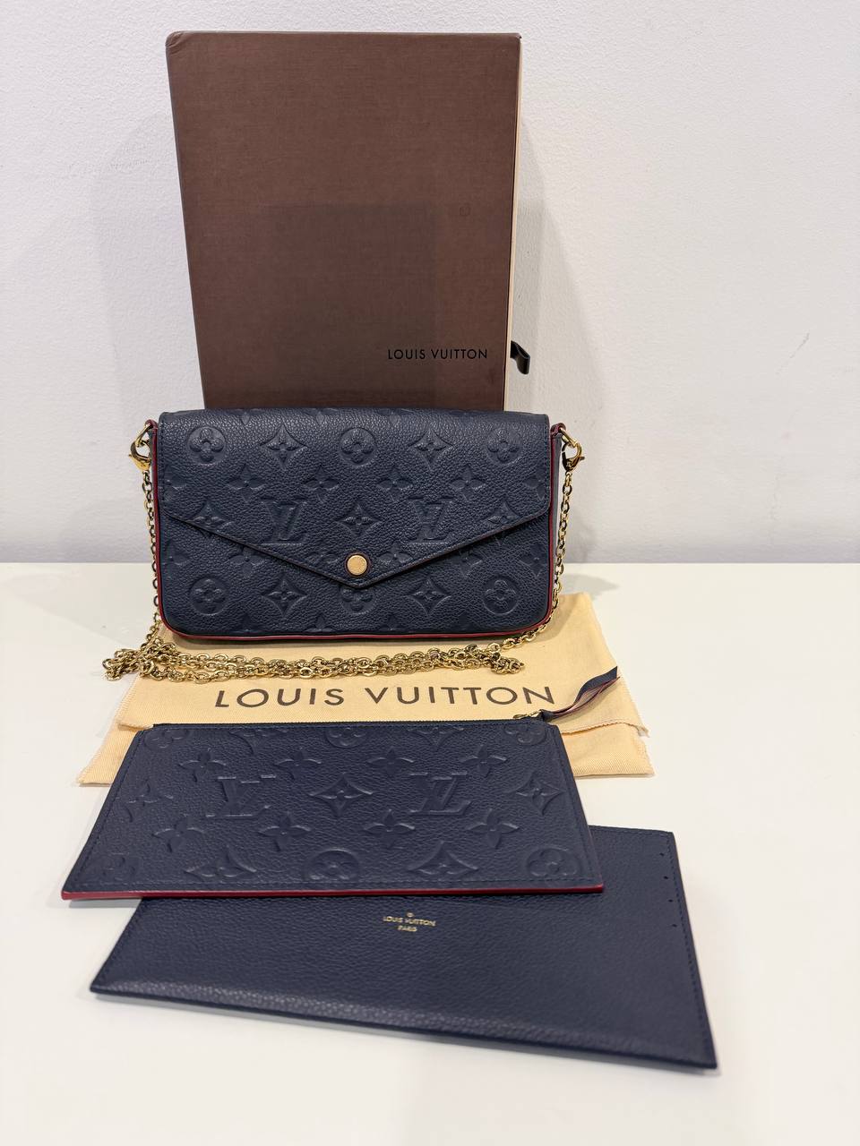 Félicie Pochette – Monogram Empreinte Leather (Navy Blue)