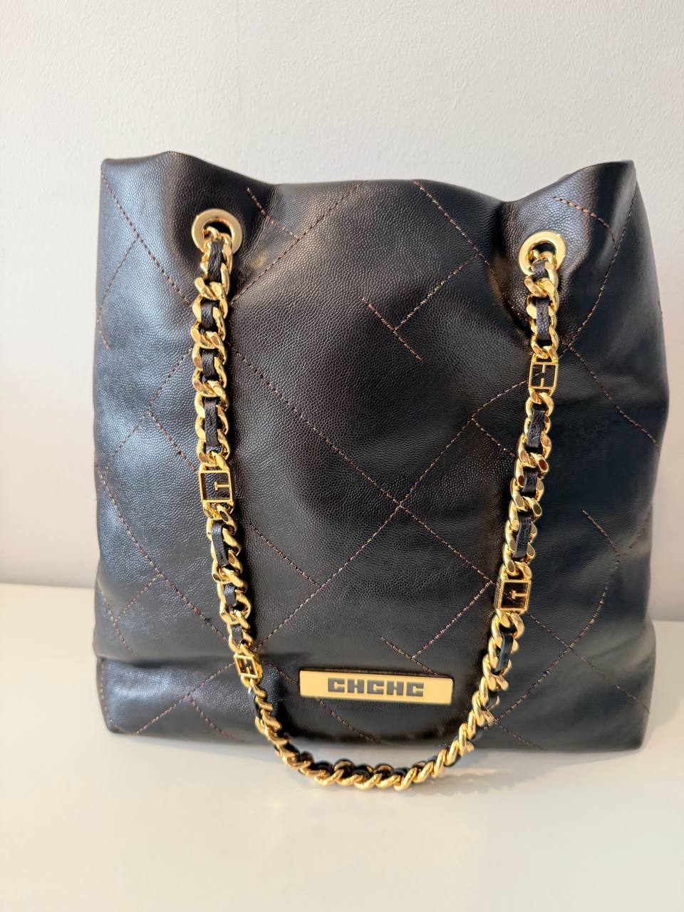 Pre-Loved Black Quilted Bucket Bag with Gold Chain Strap