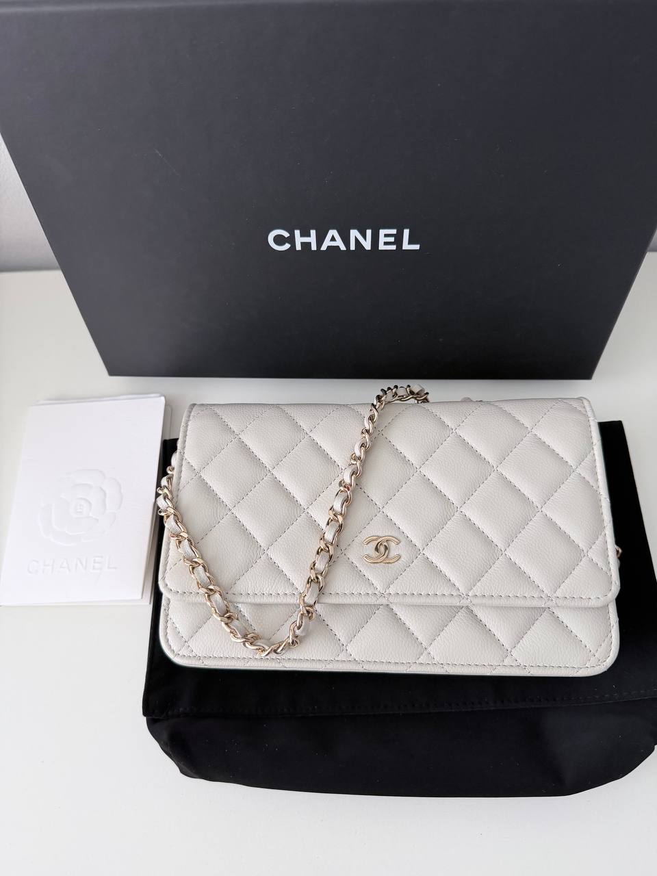 Bolso Chanel Wallet on Chain (WOC) Timeless en Piel Caviar Off-White - Blanco