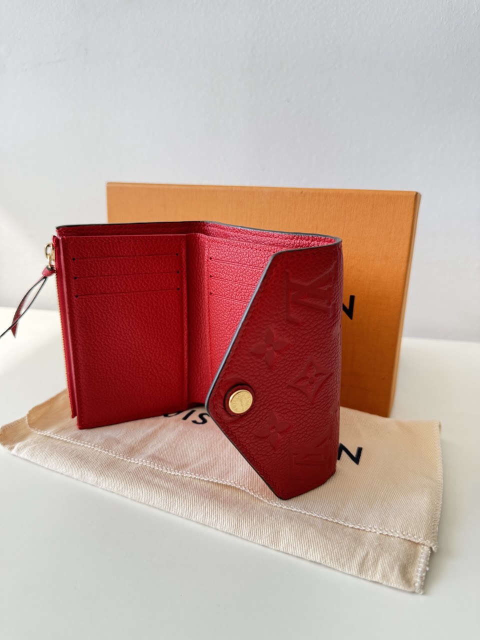 Victorine Wallet in Monogram Empreinte Leather Cherry Berry