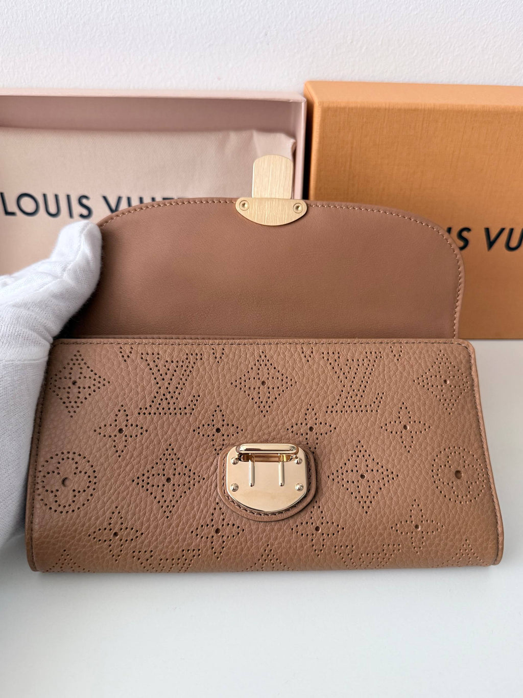 Perforated Monogram Mahina Sarah Wallet — Excellent Condition