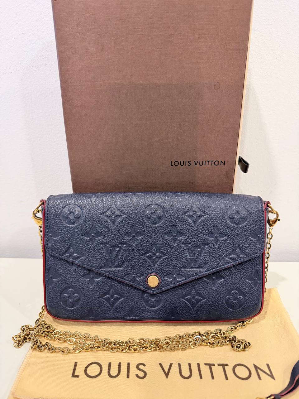 Félicie Pochette – Monogram Empreinte Leather (Navy Blue)