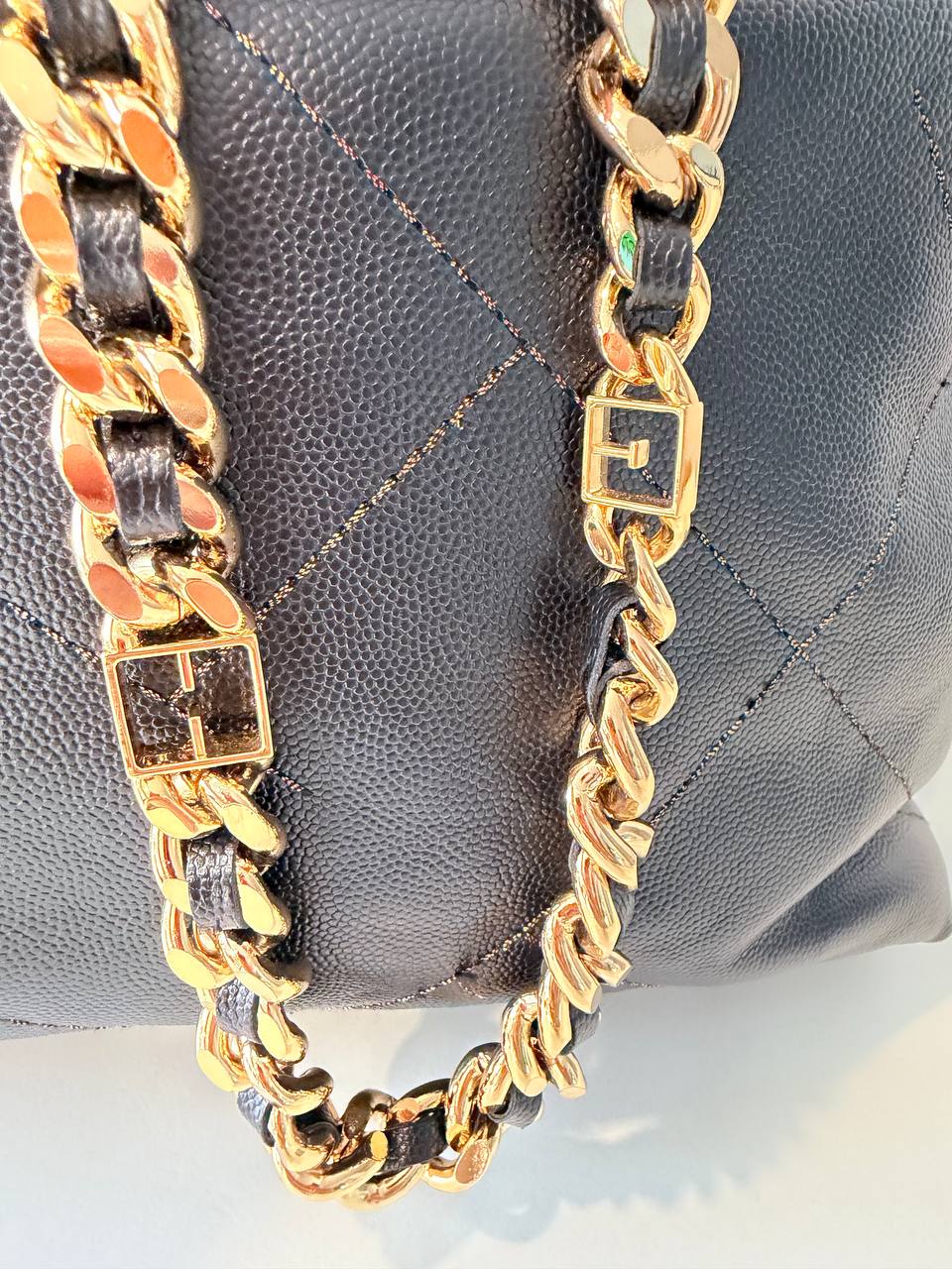 Pre-Loved Black Quilted Bucket Bag with Gold Chain Strap