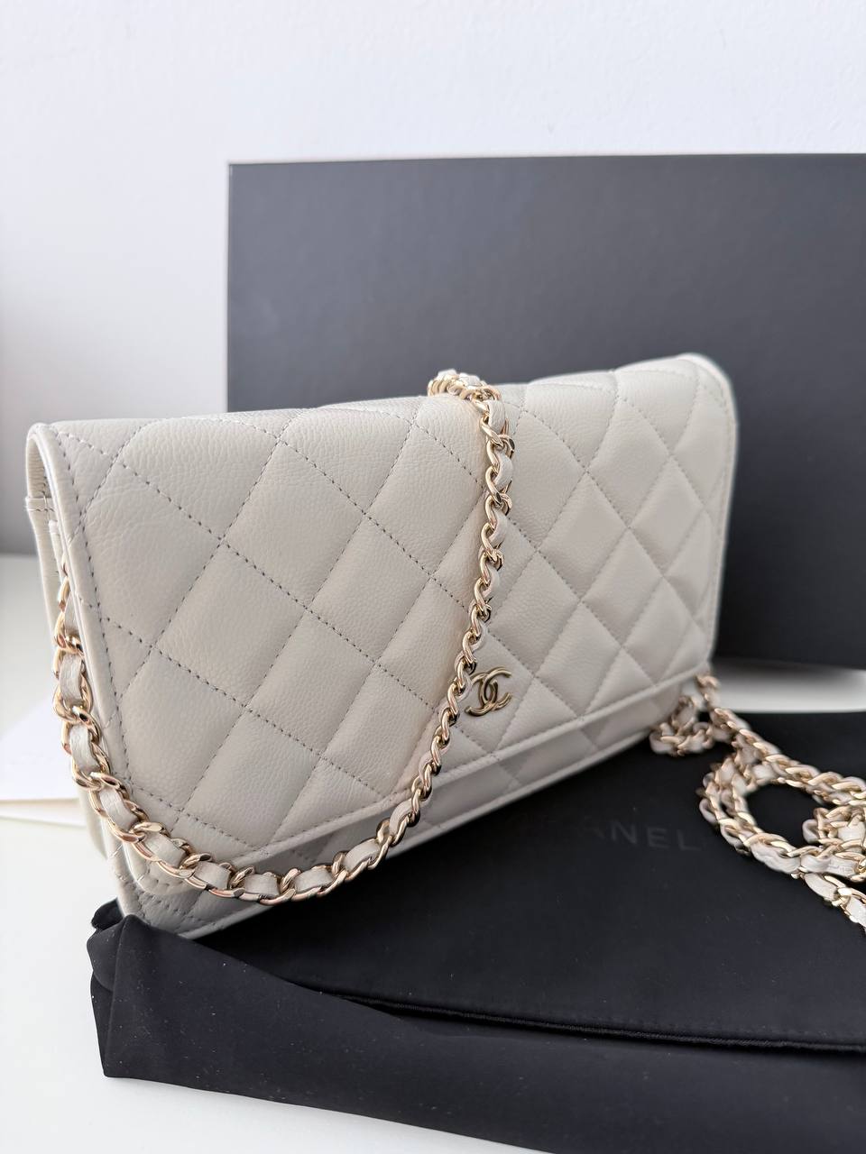 Bolso Chanel Wallet on Chain (WOC) Timeless en Piel Caviar Off-White - Blanco