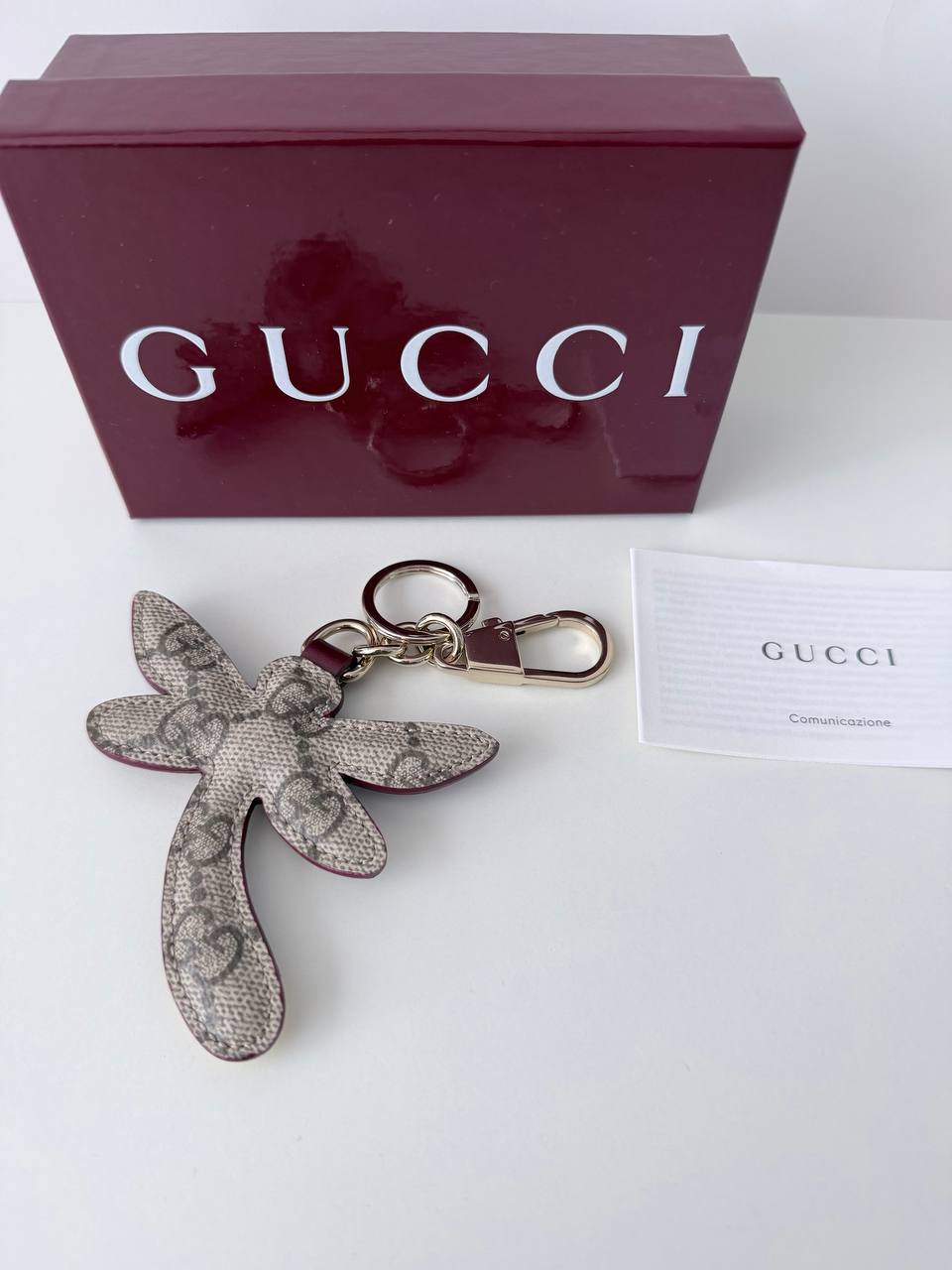 Llavero Gucci Dragonfly Bag Charm en Lona GG Supreme