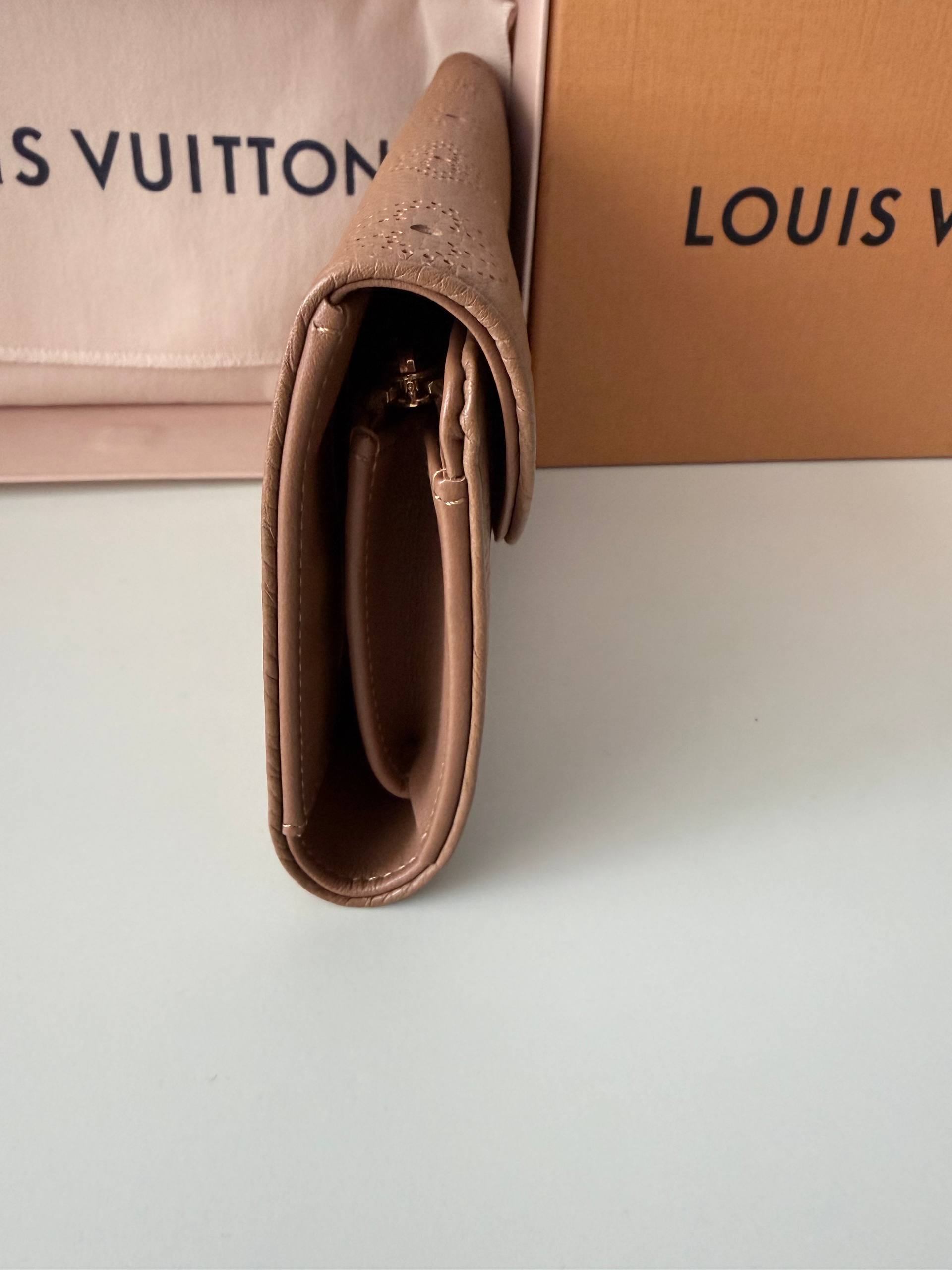 Perforated Monogram Mahina Sarah Wallet — Excellent Condition