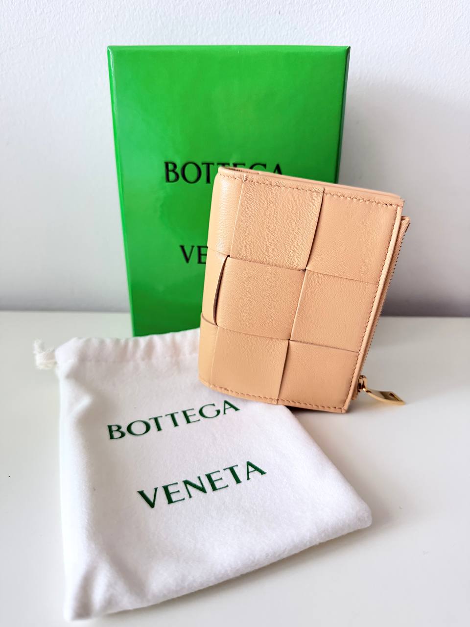 Pre-Owned Intreccio Leather Bi-Fold Wallet with Zip Coin Pocket – Beige
