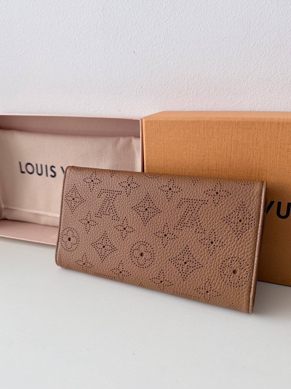 Perforated Monogram Mahina Sarah Wallet — Excellent Condition