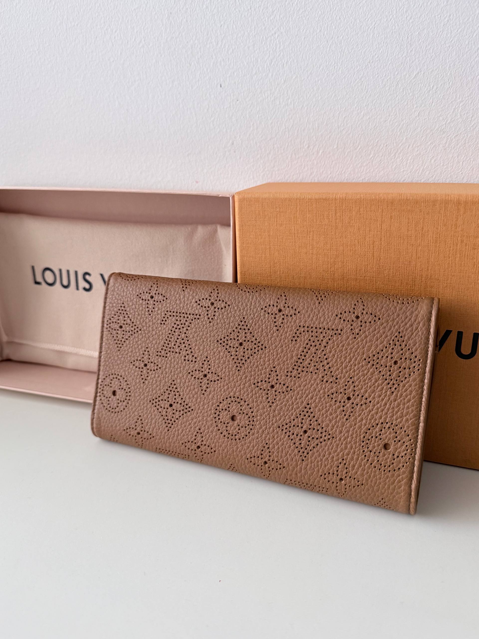 Perforated Monogram Mahina Sarah Wallet — Excellent Condition