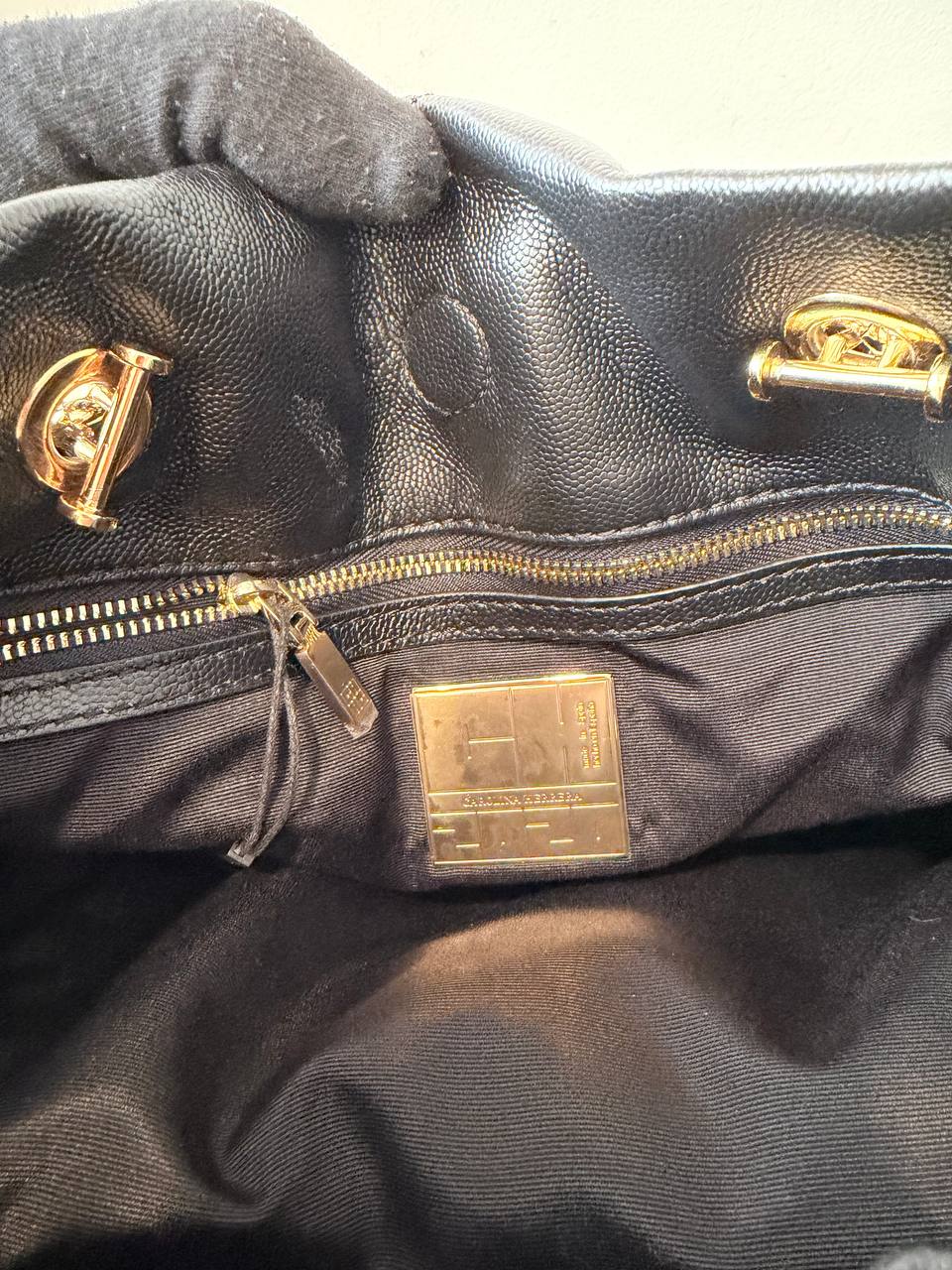 Pre-Loved Black Quilted Bucket Bag with Gold Chain Strap