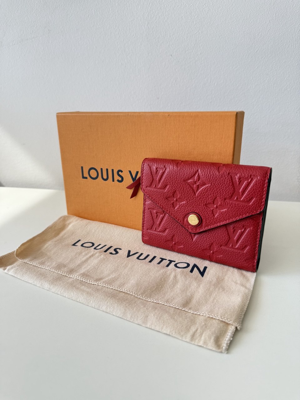 Victorine Wallet in Monogram Empreinte Leather Cherry Berry